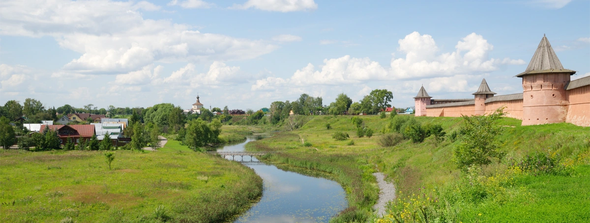 Summer landscape with a view of the Kamenka river and the Spaso-Evfimiev monastery. The city of Suzdal. The Golden ring of Russia
